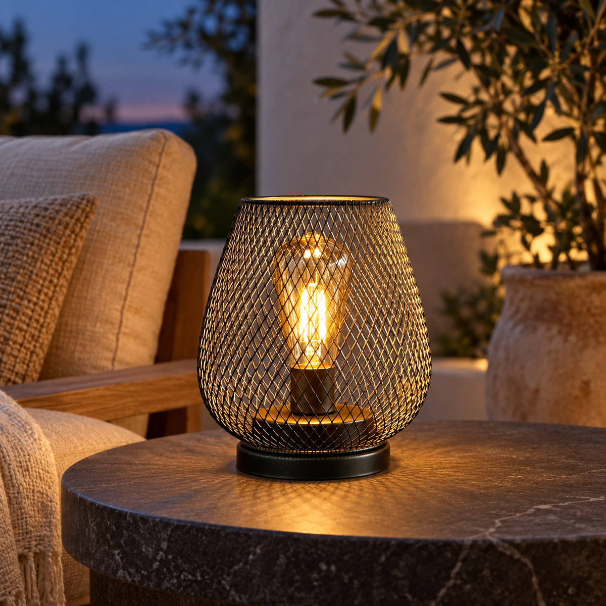 Portable wireless LED table lamp, battery operated cordless lamp with warm light on a table