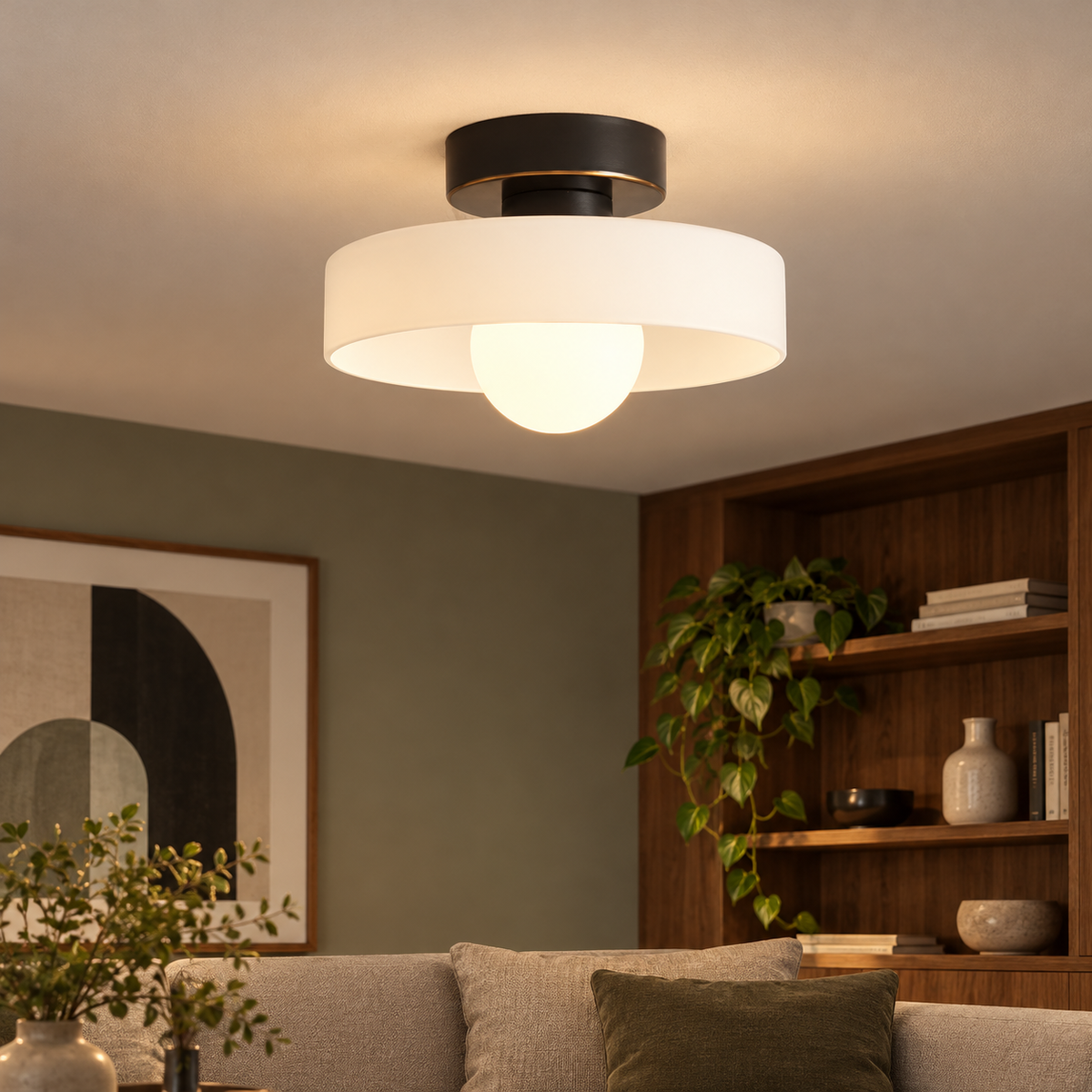 Bauhaus glass ceiling light with round white shade and black base in a living room